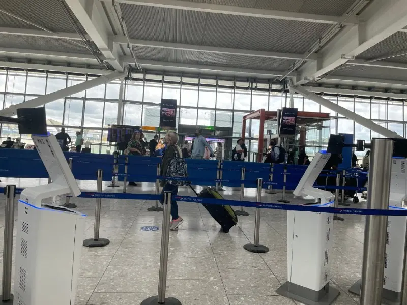 Queue barriers and posts before the control area in a London Heathrow terminal
