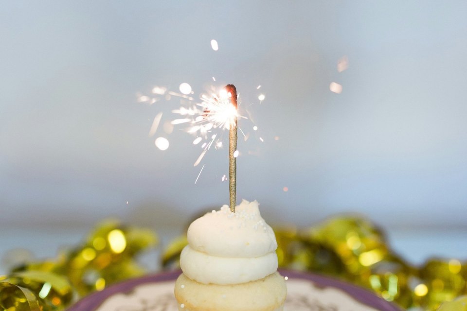 A cupcake with a sparkler — a birthday treat