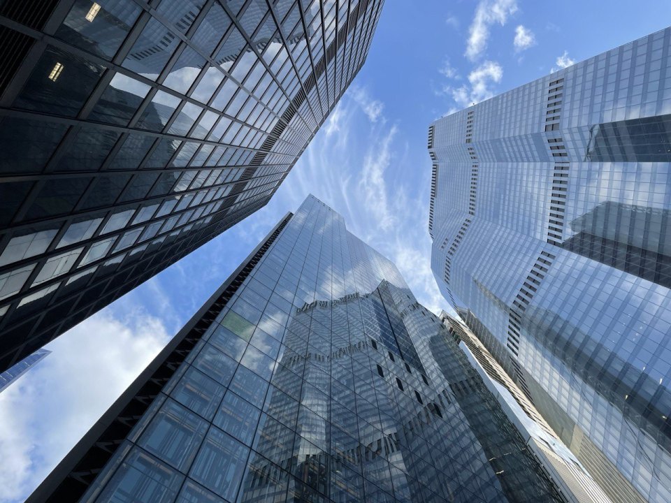 Modern glass buildings against the sky