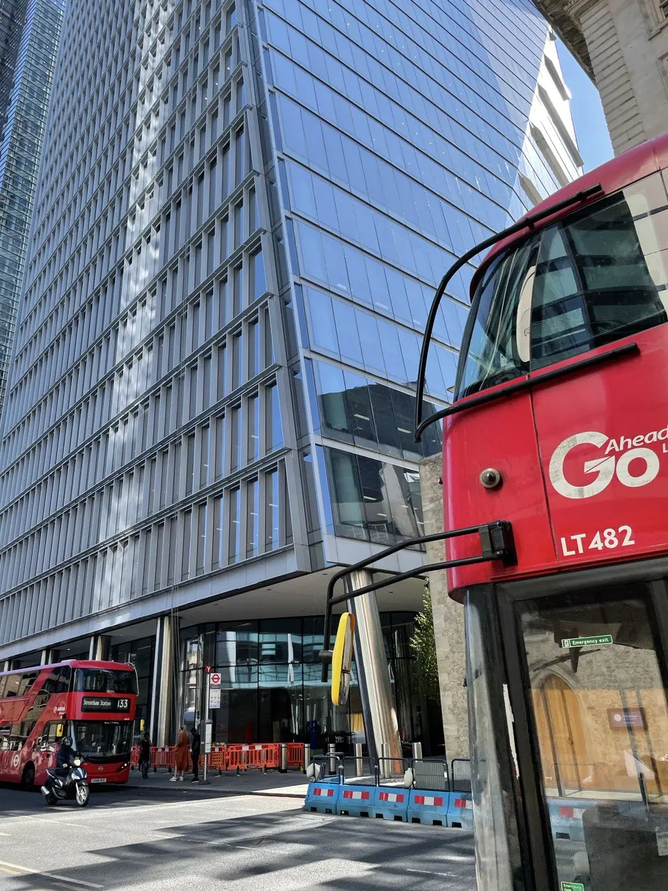 A red bus on a London street