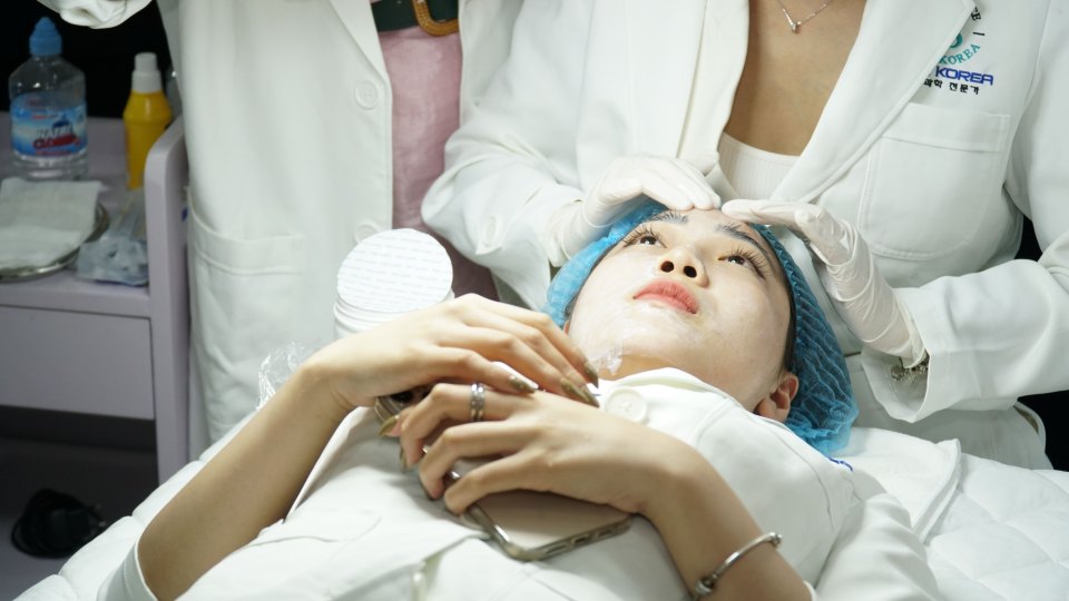 A client receiving a cosmetic treatment in a clinic