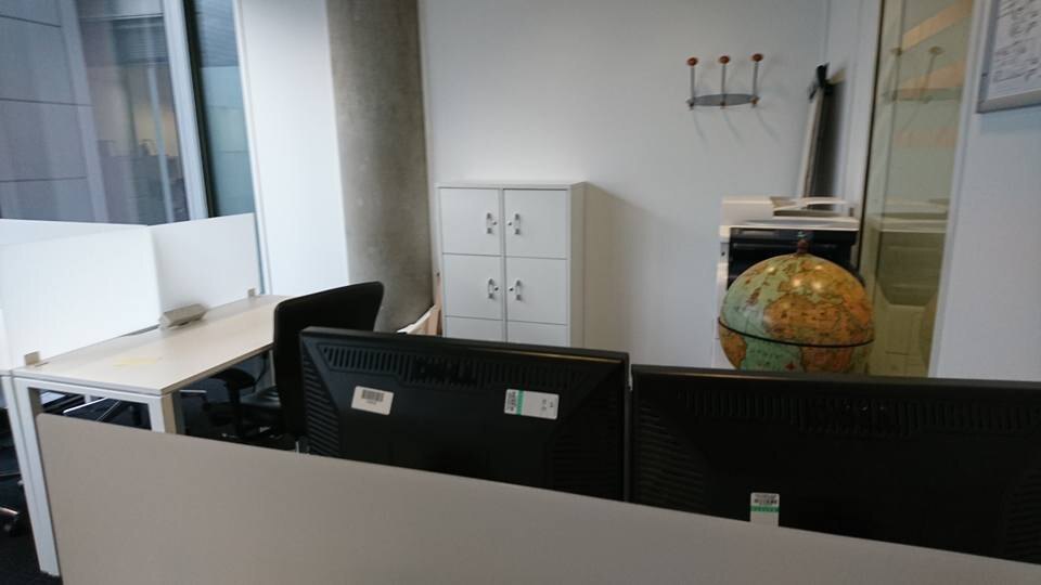 Desks and computers in a London office