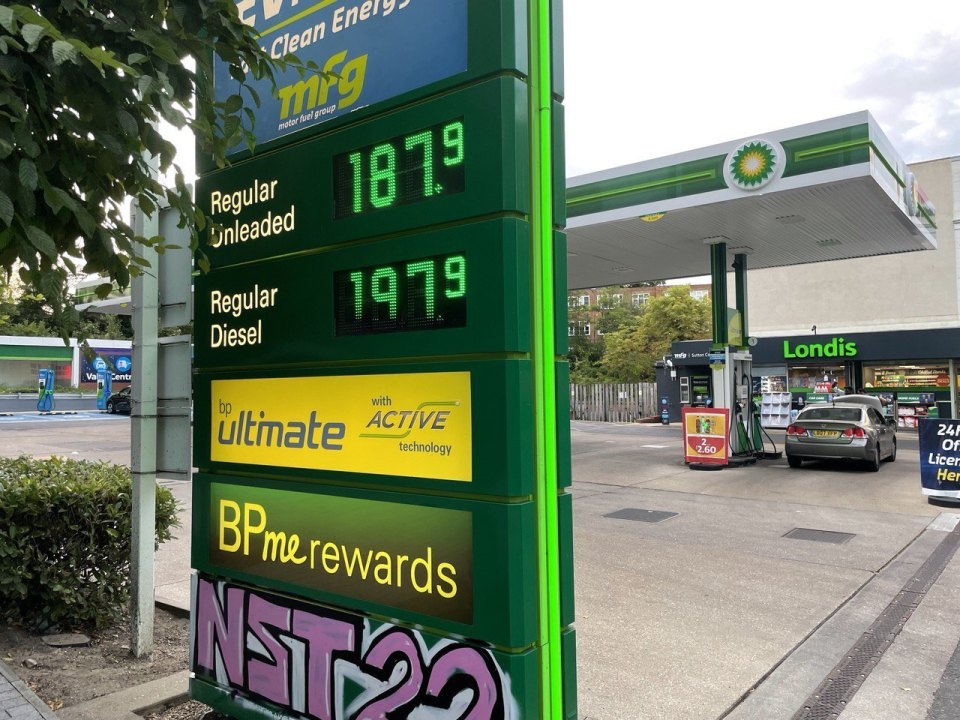 Fuel price board showing pence per litre at a filling station