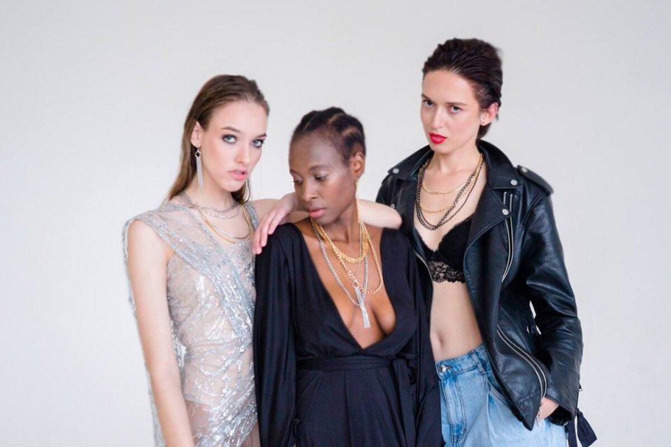 Three models during a studio photo shoot