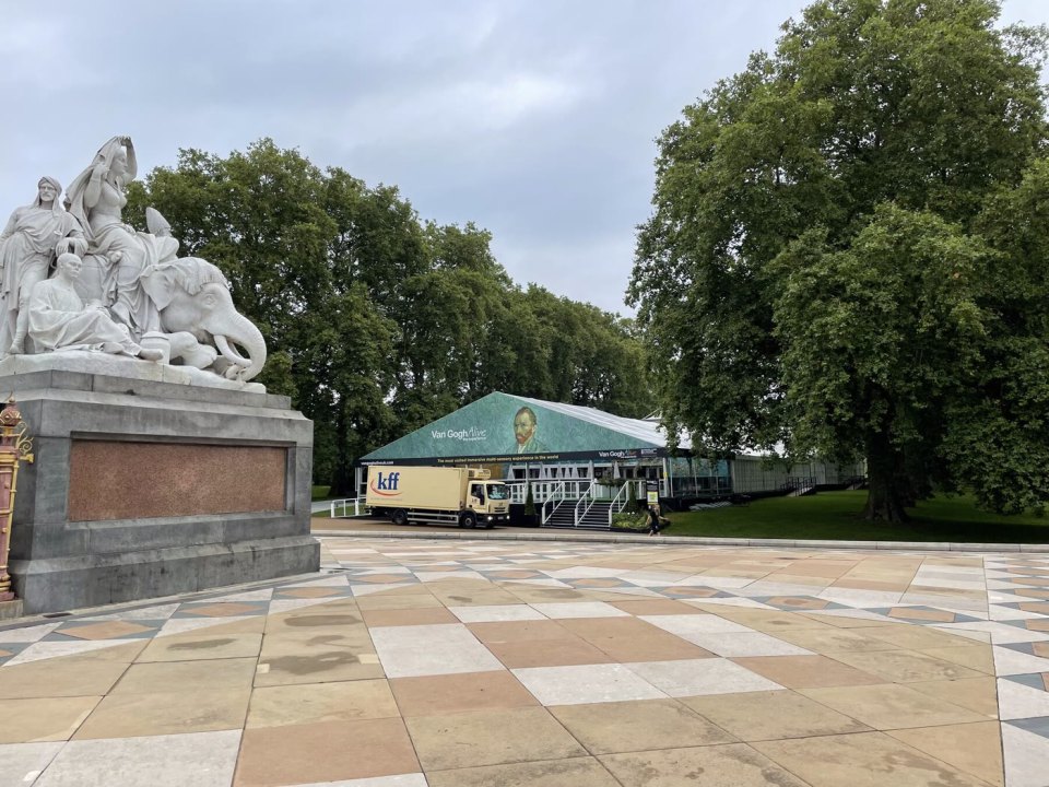 A green London park with a monument
