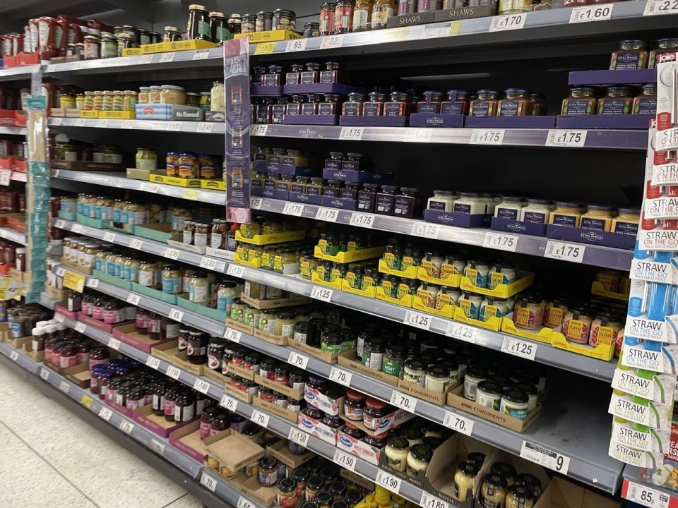 Shelves in a British supermarket with price labels