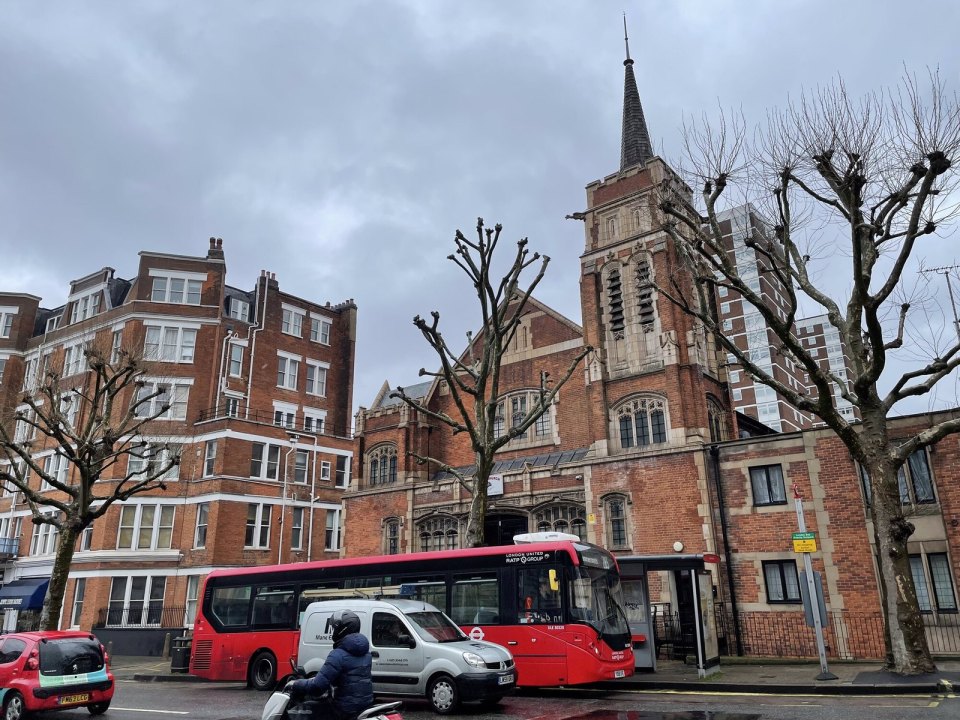 Red brick houses sharing walls on a London street