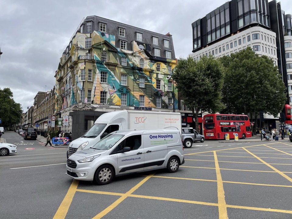 A van on a London street at a yellow box junction