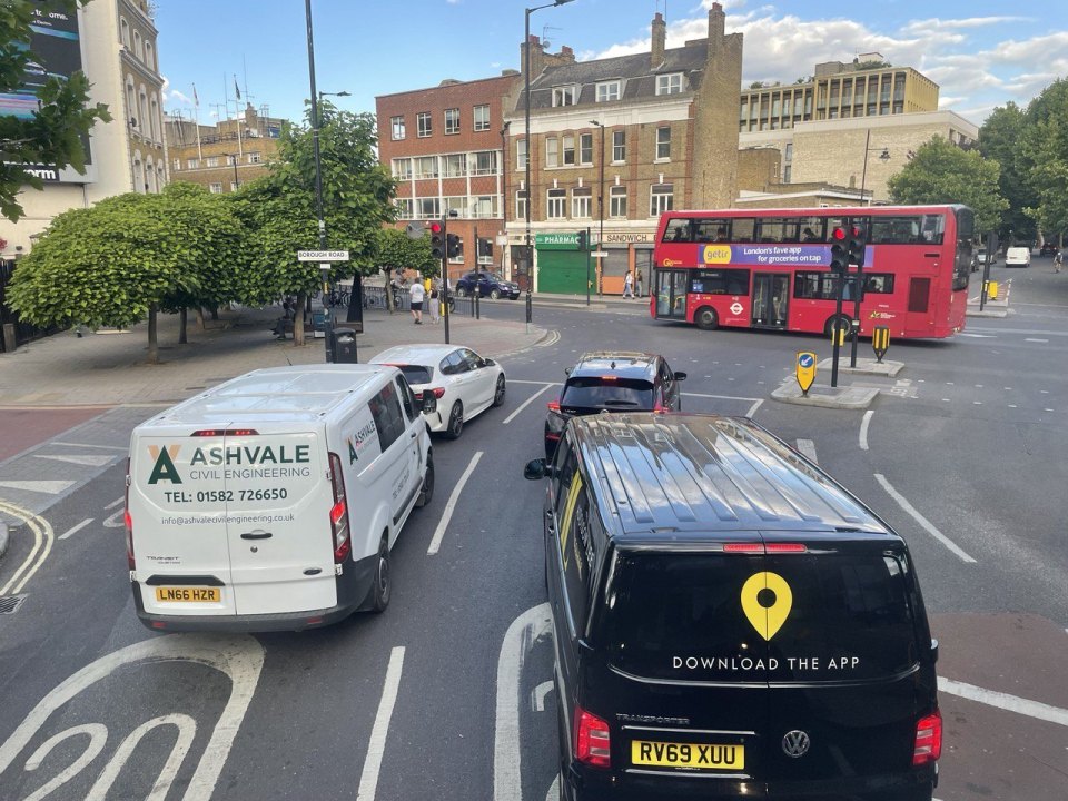 Cars with UK number plates at a London junction