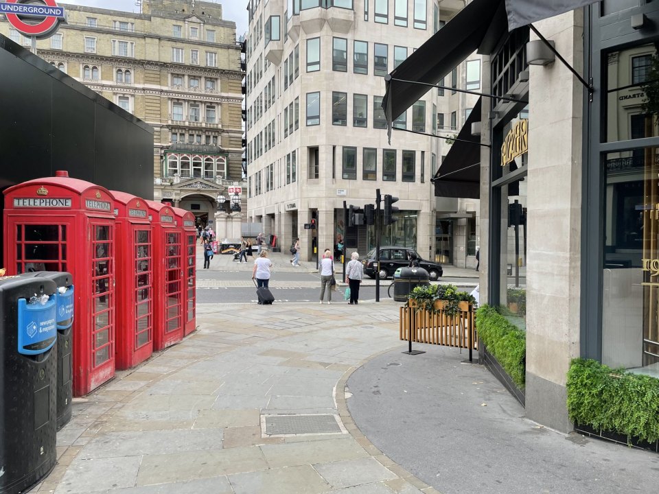 Red telephone boxes on a London street