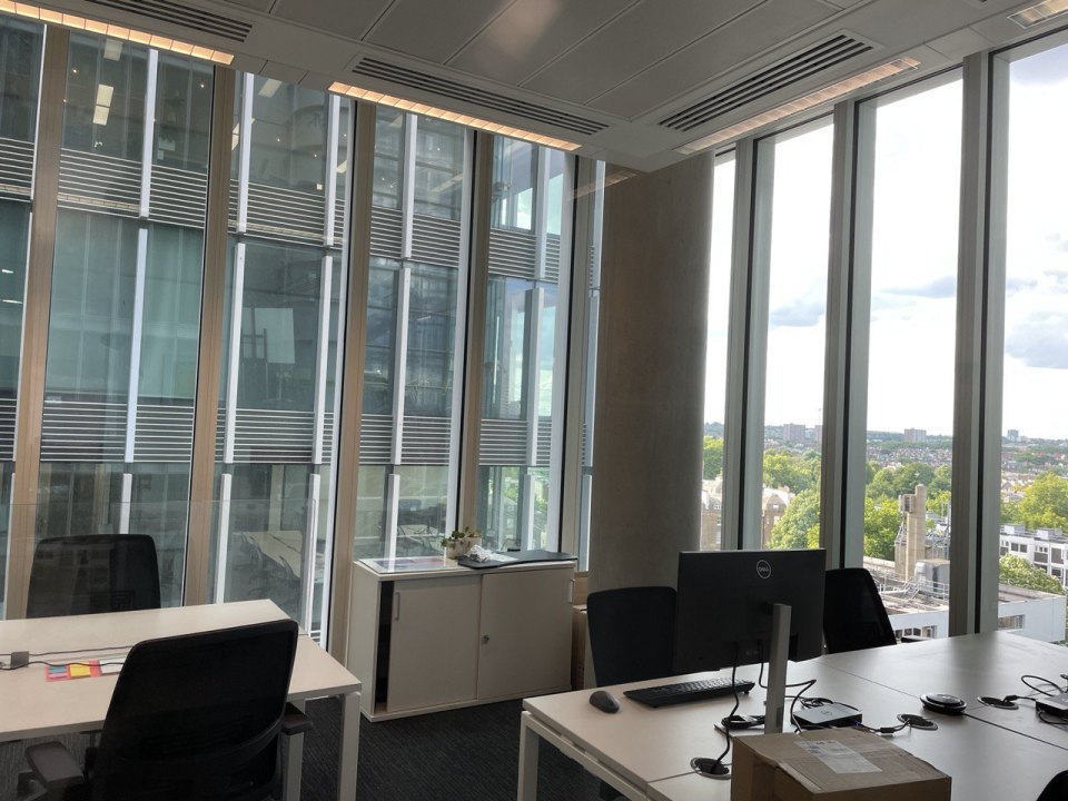 An open-plan office with desks