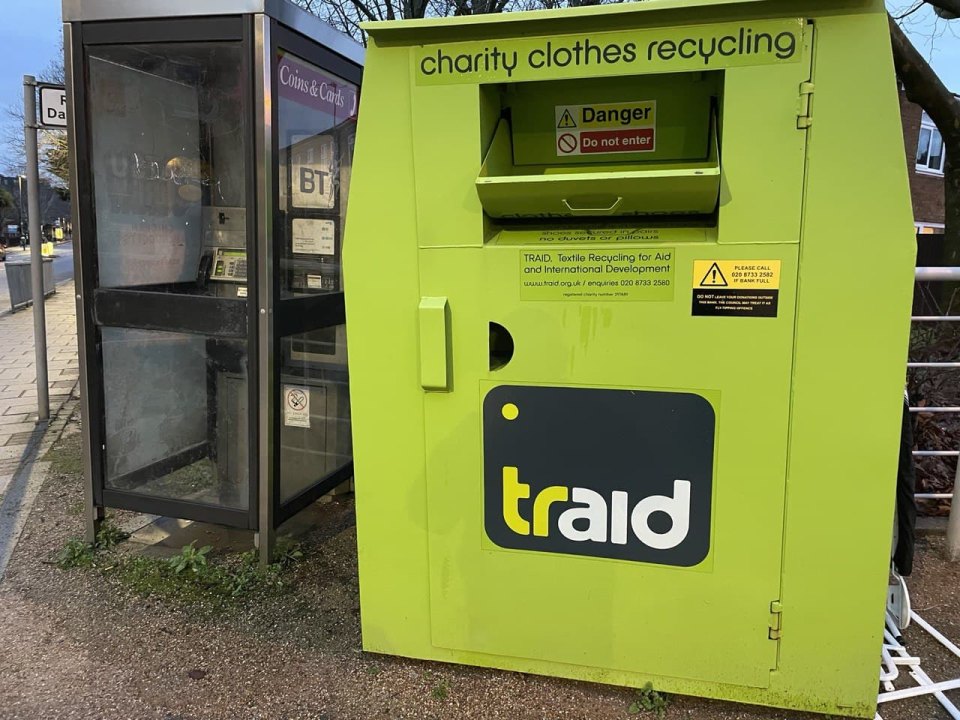 A charity clothing collection bank on a street
