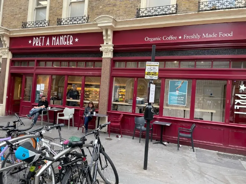 The storefront of a Pret a Manger coffee shop on a London street