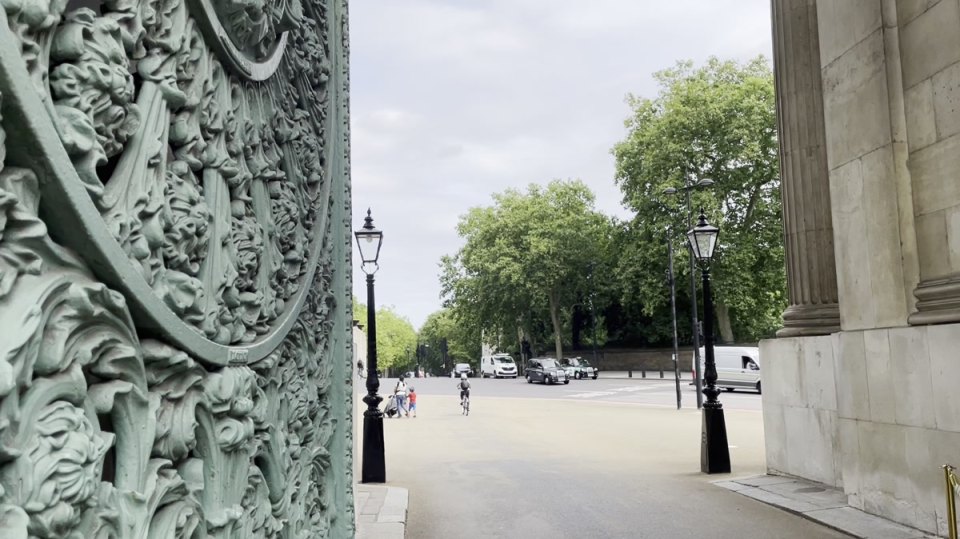 Historic gates and a street in central London