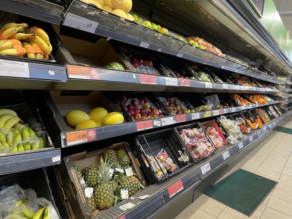 A fruit and vegetable aisle in a British supermarket