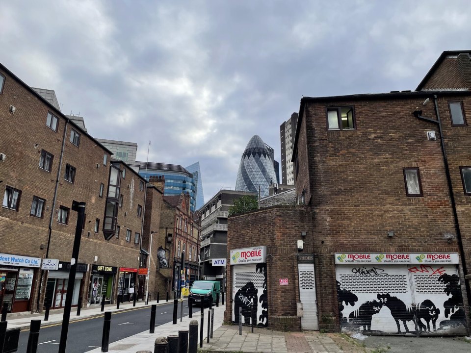 A London residential street with brick blocks of flats