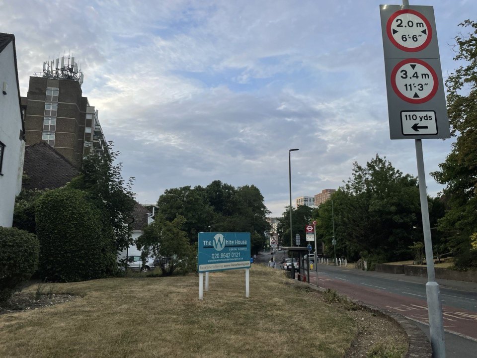 A British road with traffic signs and direction signs