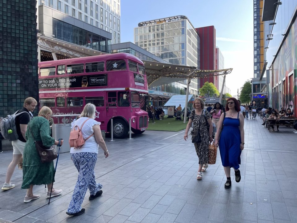 People walking through a London shopping quarter