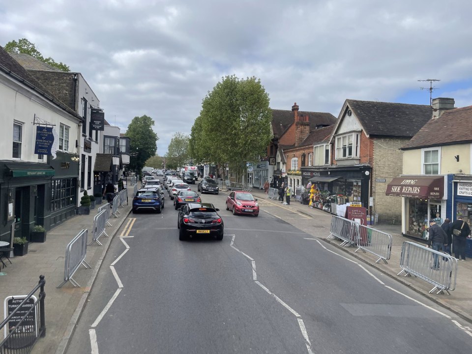 An English small-town high street lined with independent shops