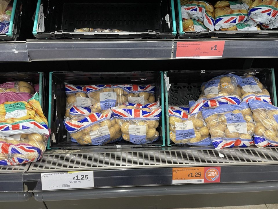 Bread shelf with price labels in a UK supermarket