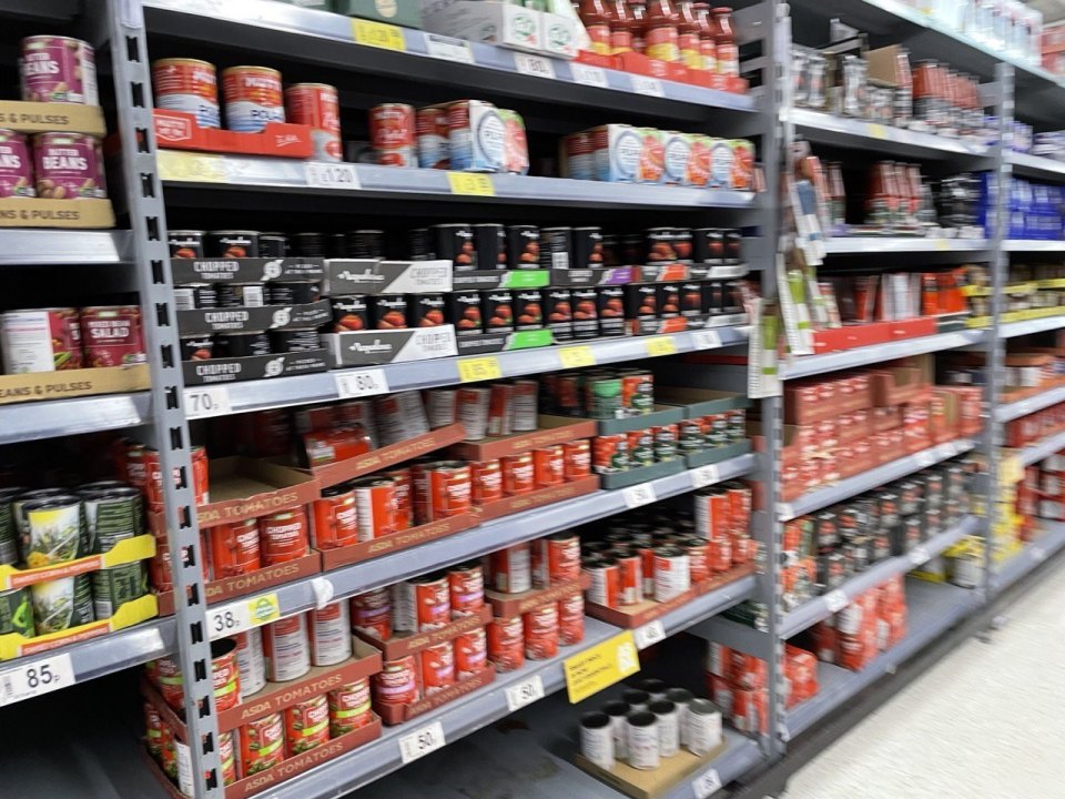 Shelves of tinned food and groceries in a British supermarket