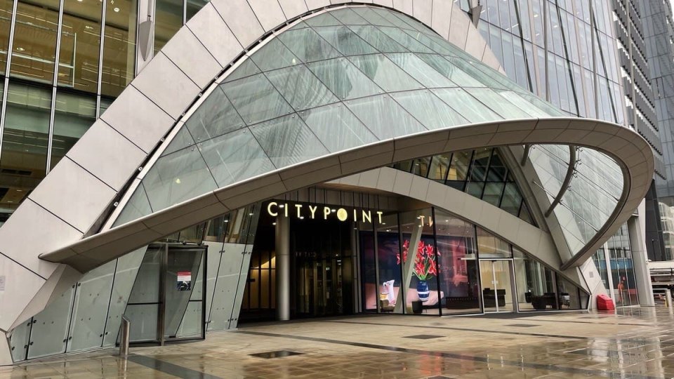 Wet pavement outside CityPoint in London