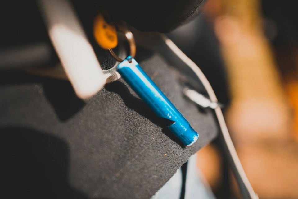 A metal whistle, close up